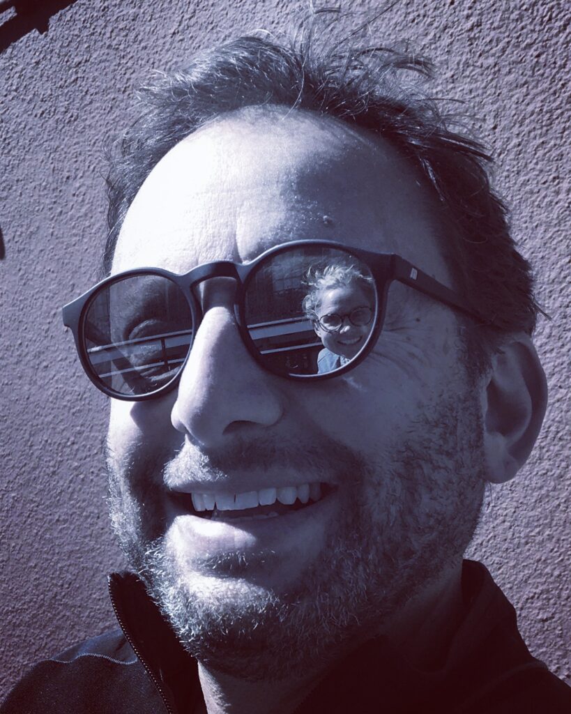 Mark Lesser - sunglasses mugshot - Green Olive Arts